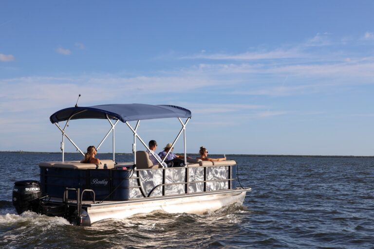 A pontoon boat out on a charter from Sebastian Watercraft Rentals